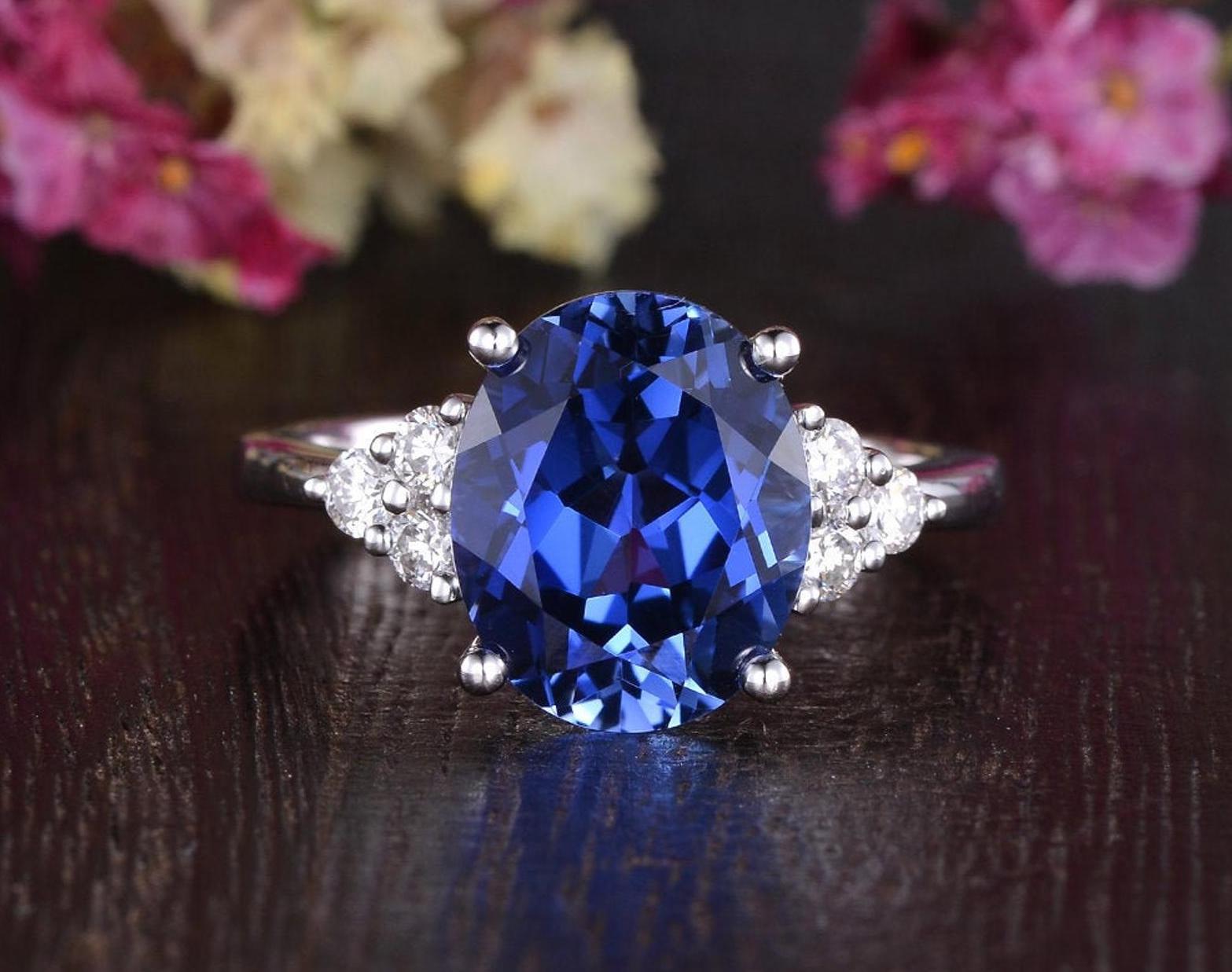 Sapphire engagement ring best sale with diamond side stones
