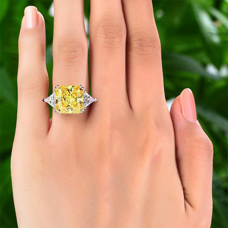 Vivid Elegance This one of a kind exquisite ring features a 5.03 carat Fancy  Vivid Yellow central ston… | Diamond, Exquisite jewelry, Yellow diamond  engagement ring