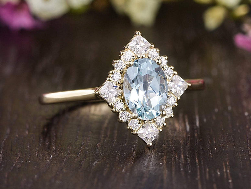 Vintage oval cut best sale engagement rings