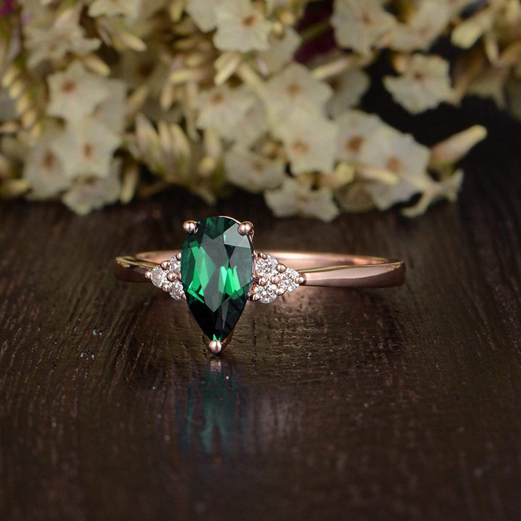 Pear cut clearance emerald engagement ring